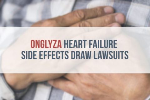 Man experiencing chest pain has hands folded over heart