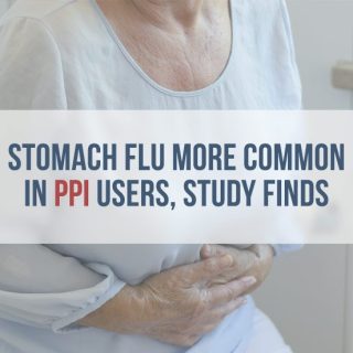 older woman clutching her stomach