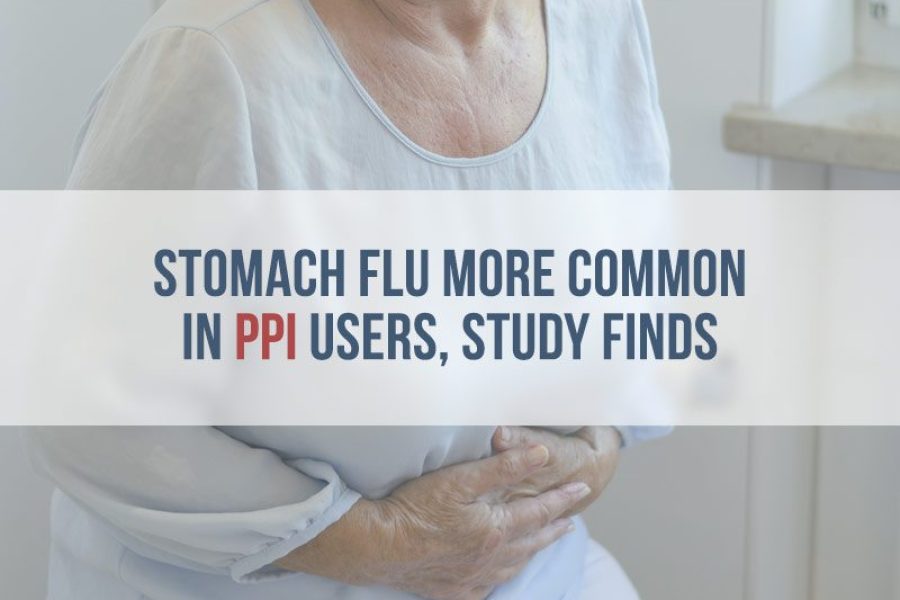 older woman clutching her stomach