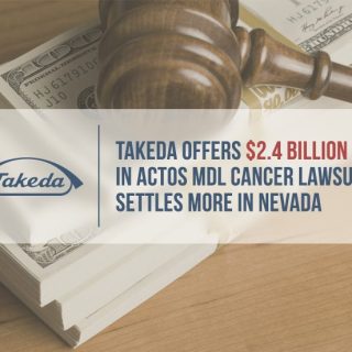 Gavel resting on one hundred-dollar bill stack