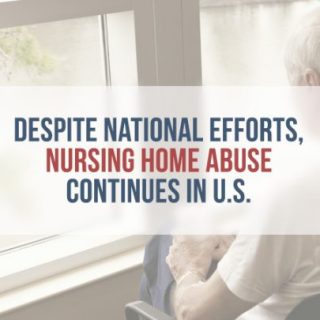 elderly man sitting in a chair, looking out a window