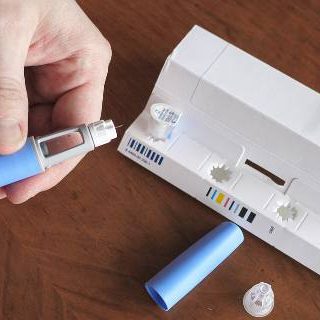 Man holding semaglutide injection