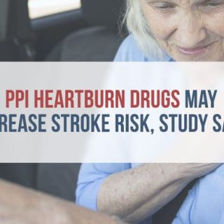 elderly woman clutching her chest in the drivers seat