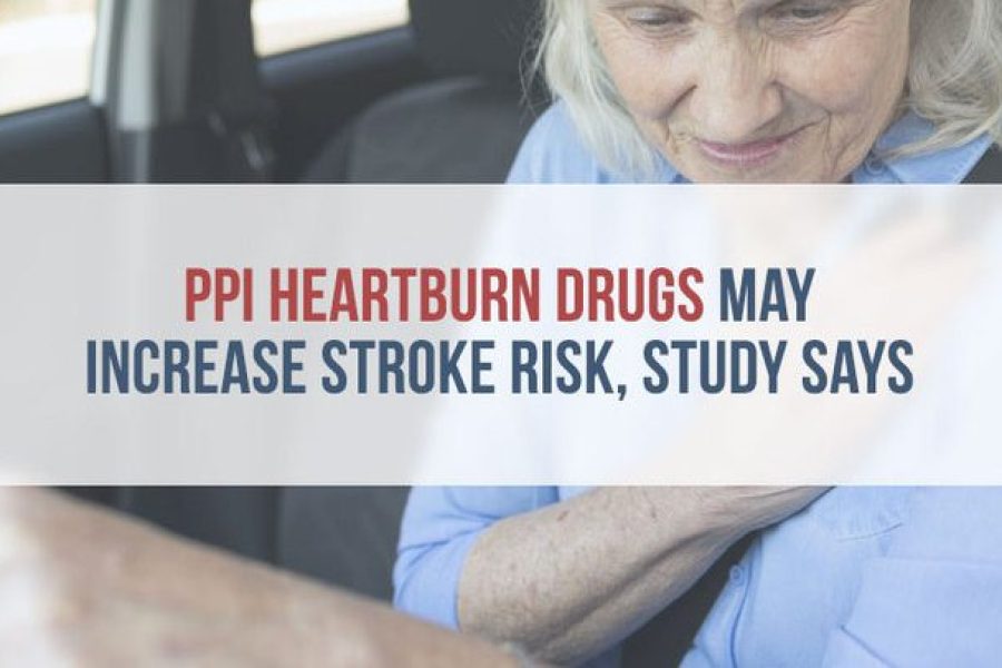 elderly woman clutching her chest in the drivers seat