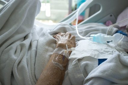 Elderly Patient in Hospital Bed