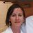 Headshot of Dr. Shannon Fitzgerald, a toxicologist and pharmacist, wearing a white lab coat