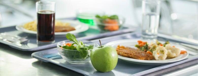 nutritional meal on cafeteria plates