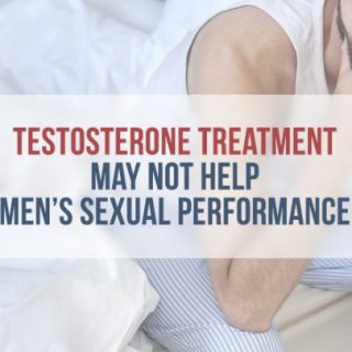 Man in striped pajamas sitting on bed