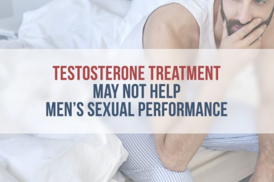 Man in striped pajamas sitting on bed