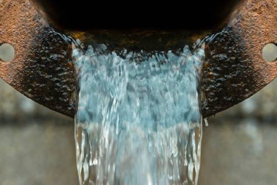Water flowing from rusted pipe