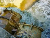 Water treatment center pipes with water