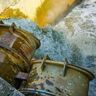 Water treatment center pipes with water