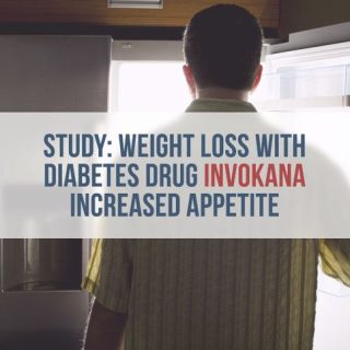 man looking into fridge