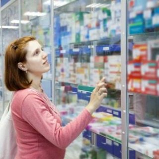 woman shopping in pharmacy