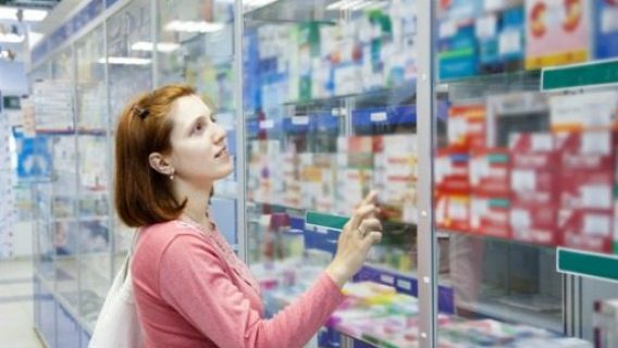 woman shopping in pharmacy