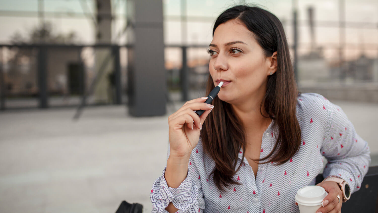 Woman using an e-cigarette