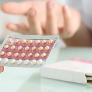 people handling birth control pills
