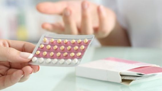 people handling birth control pills