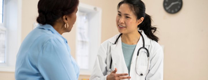 Doctor talking with patient