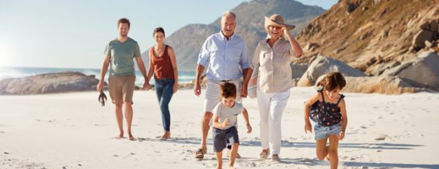 Family on the beach in the sun