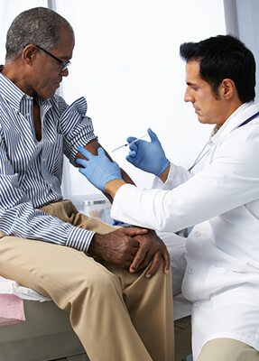 Adult Male Getting a Vaccination