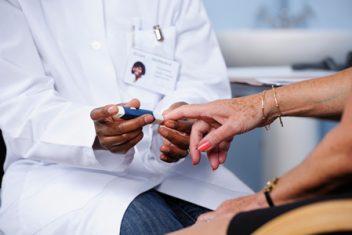 Older Woman's Blood Sugar Being Tested