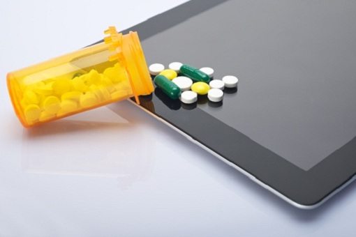 drugs_iPad pills spilled on ipad