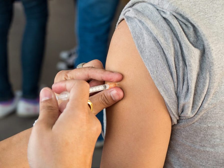Child receiving vaccination