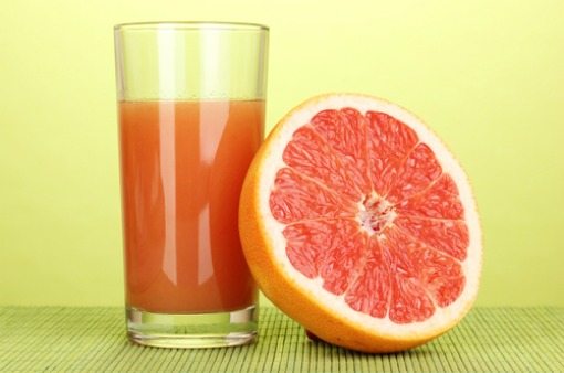 grapefruit and juice Grapefruit and cup of juice
