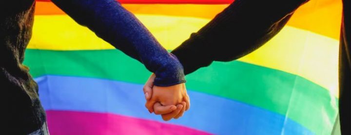 lgbtq couple holding hands