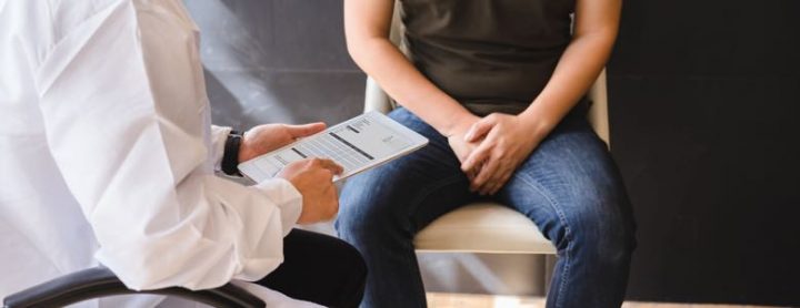 person meeting with a doctor