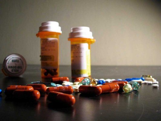 testosterone drugs Pill bottles and various pills